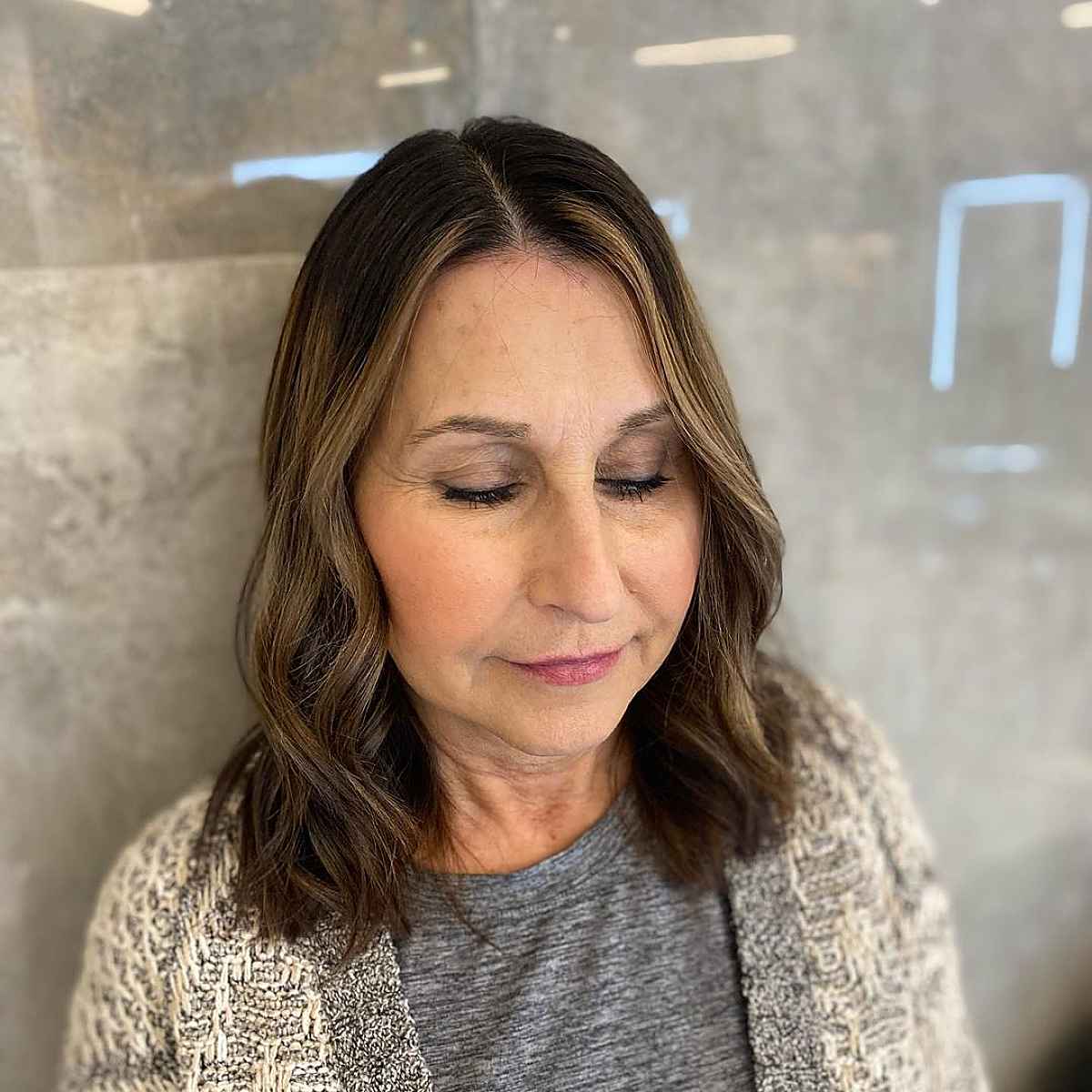 dark brown with warm highlights and a money piece