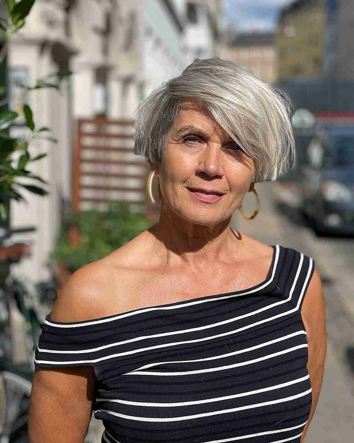 deep side parted short bob on grey hair for ladies past 50