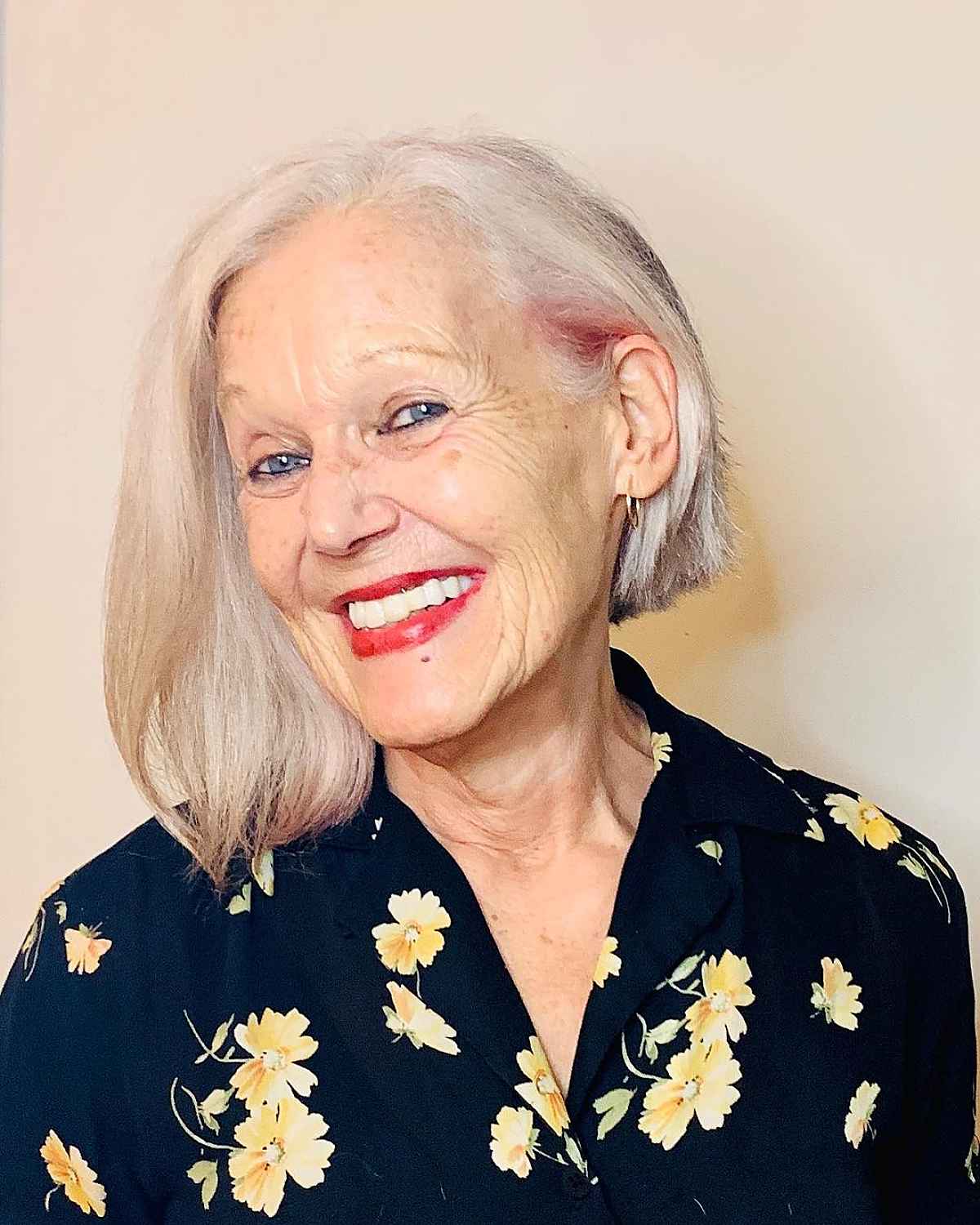 edgy asymmetrical bob for ladies in their seventies