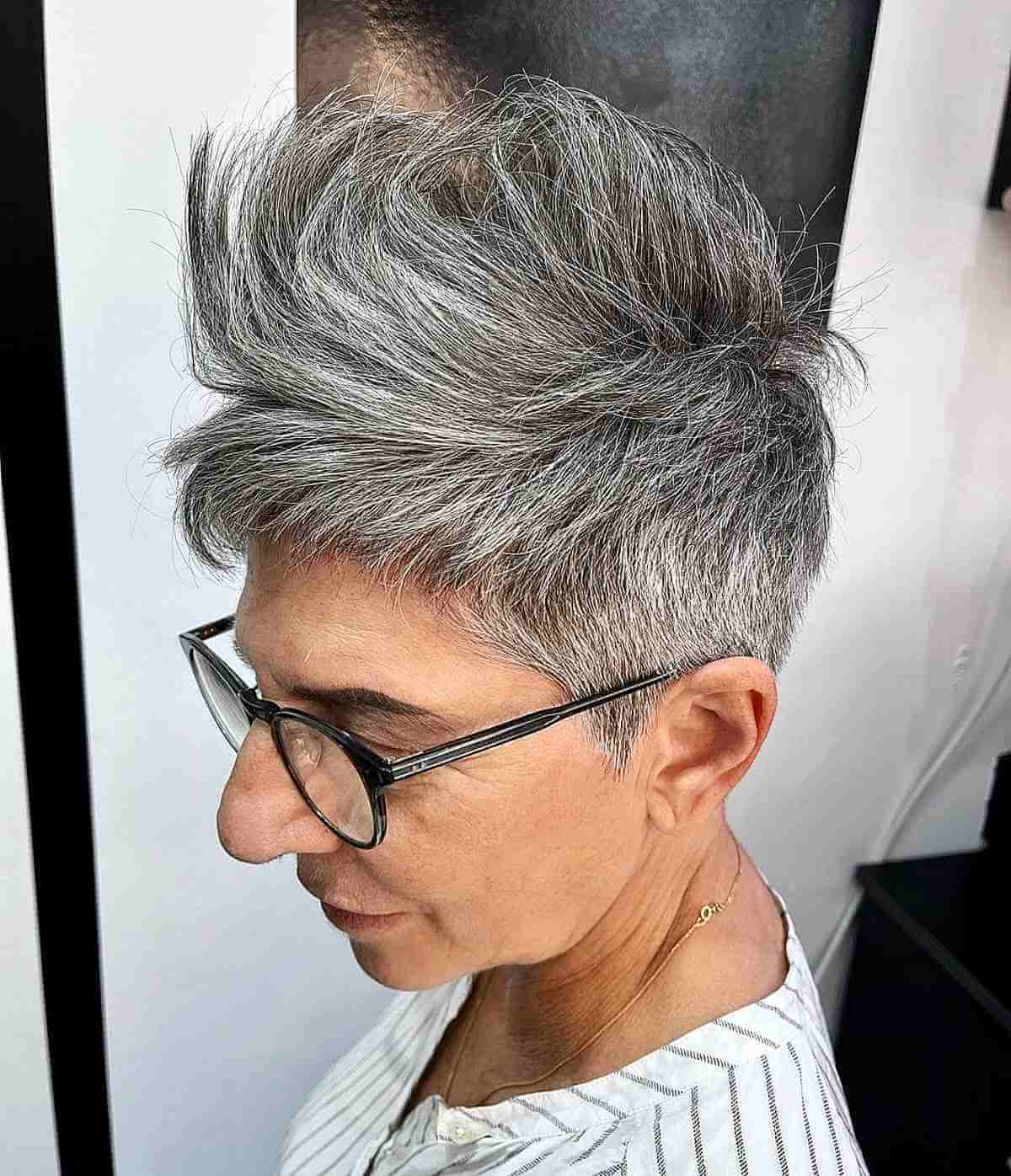 edgy pompadour pixie with short bangs for old women