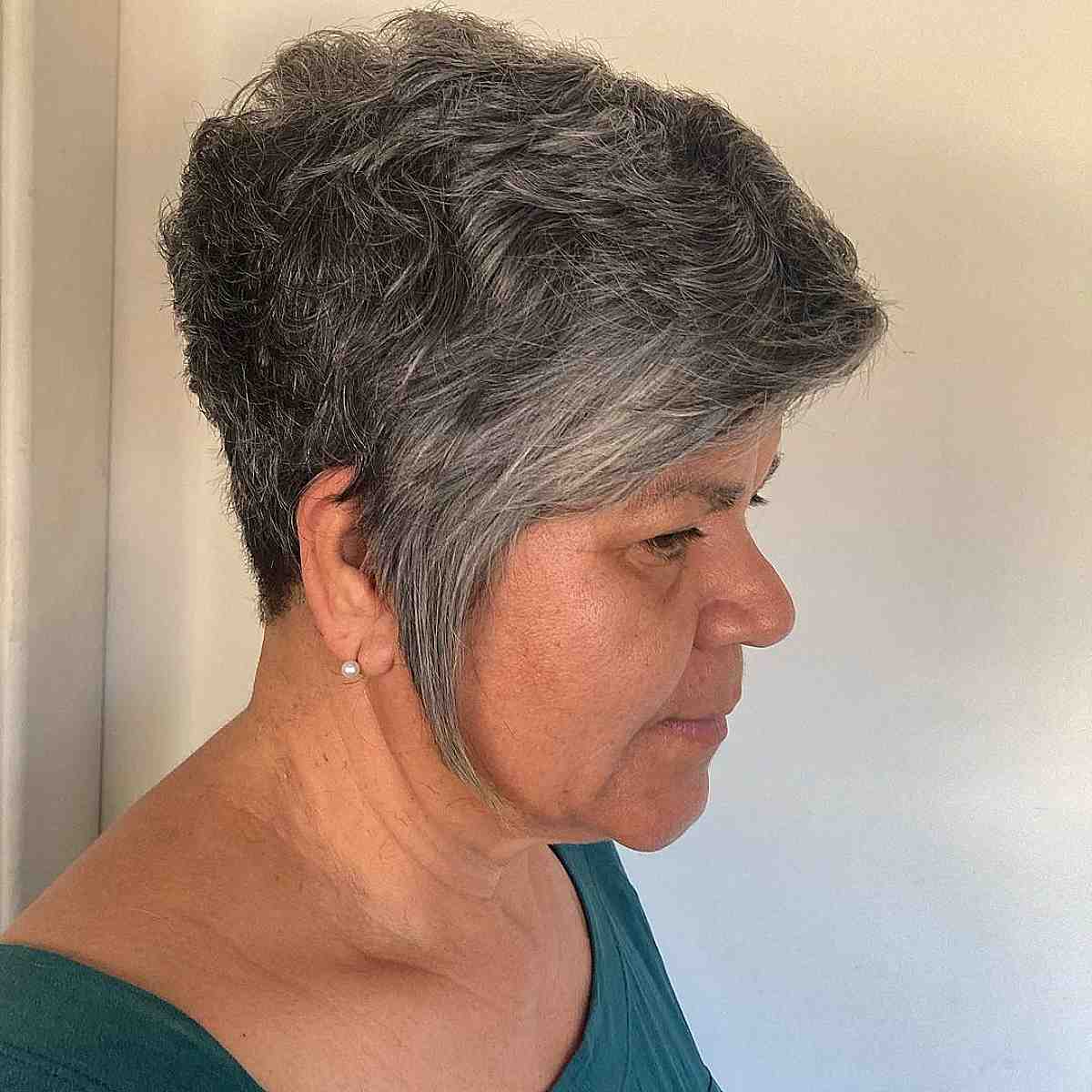 edgy silver pixie cut with long sideburns