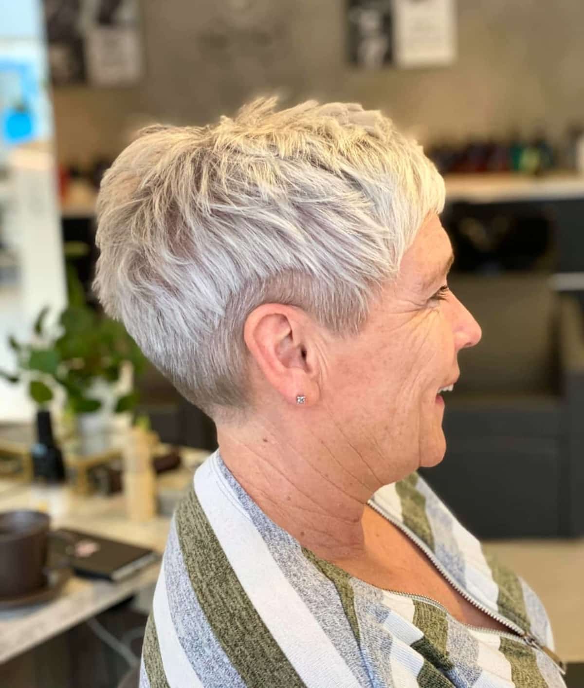edgy undercut pixie for grey haired women