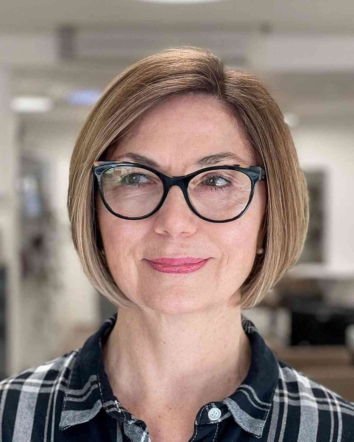 elegant side part chin length bob for 50 year old ladies