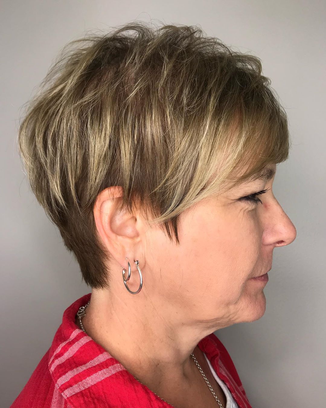 feathered blonde pixie haircut for women over 70