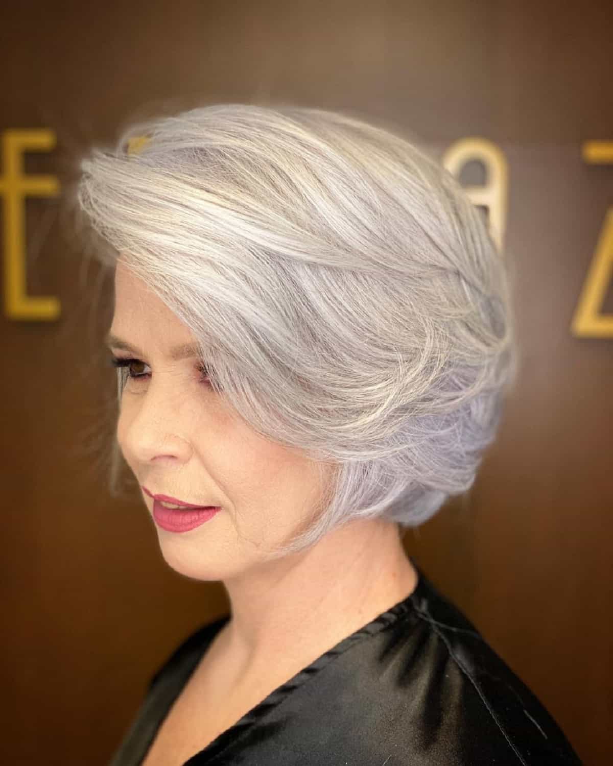 feathered bob with side swept bangs