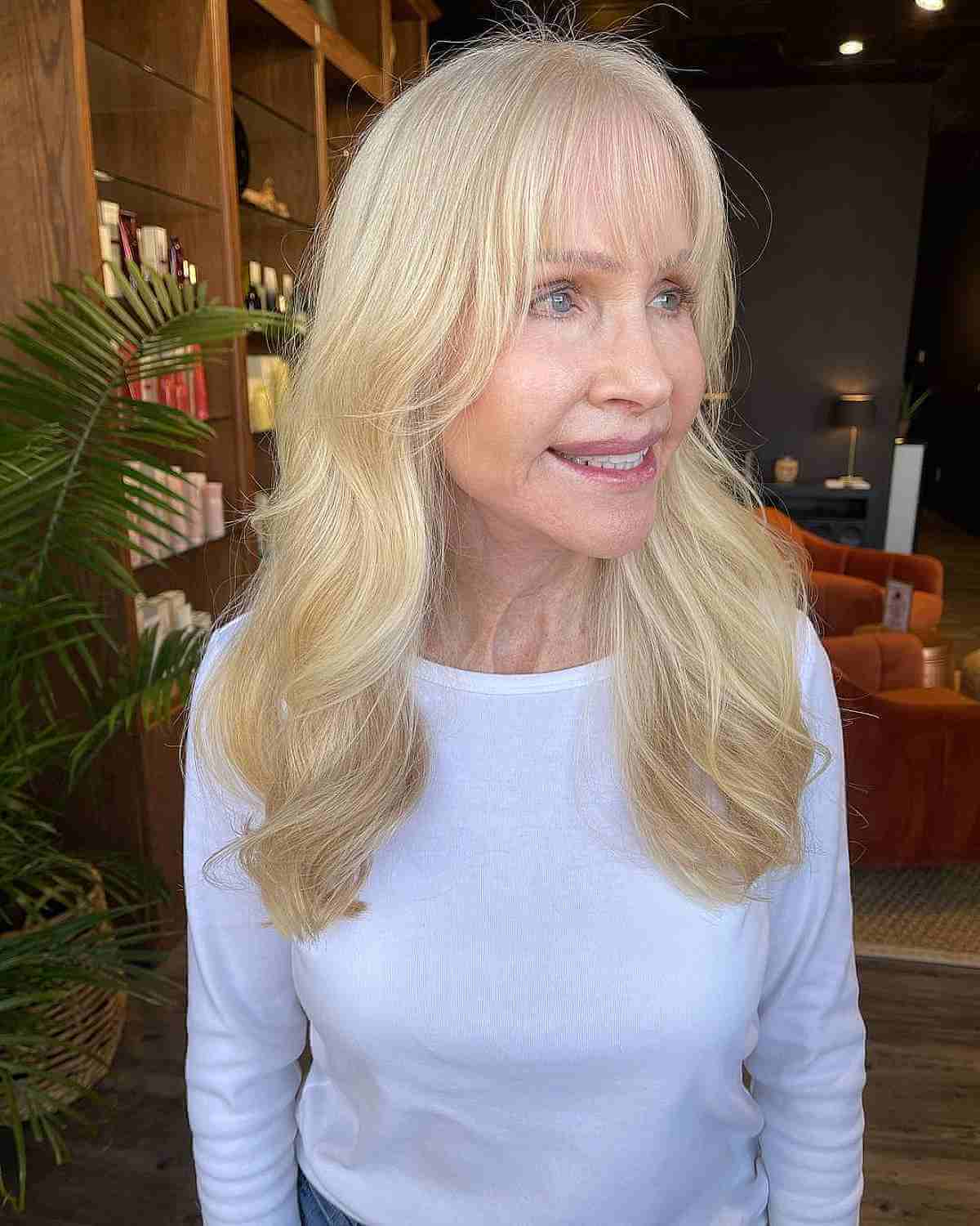 gorgeous long hairstyle with soft waves for a 70 year old woman
