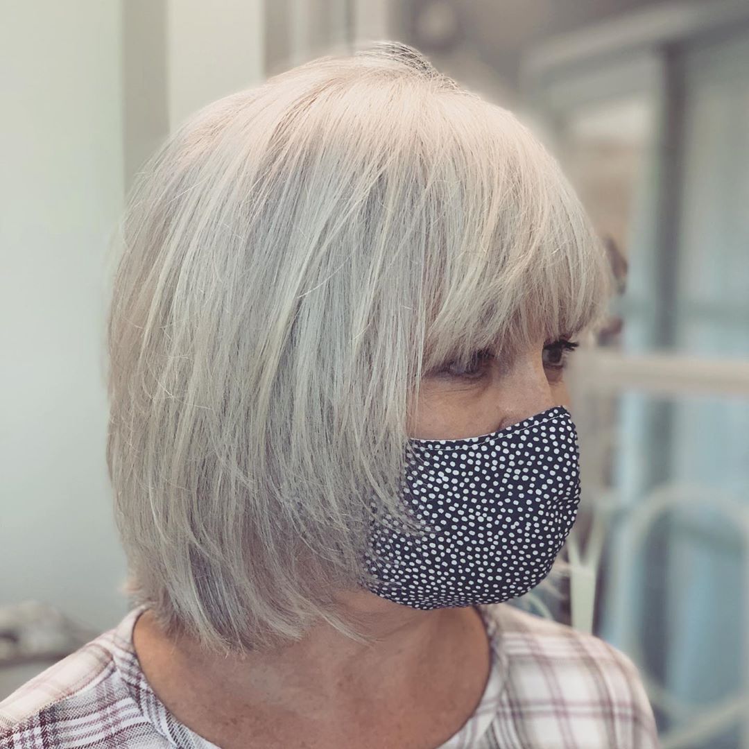 gray layered shag haircut woman over 50 fine hair