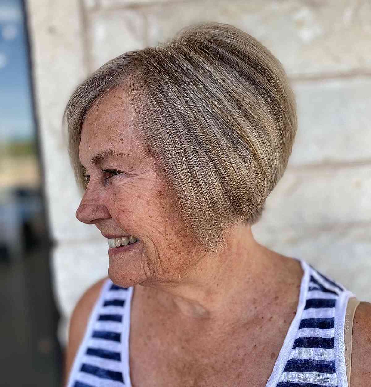 jaw length bob with blonde balayage for ladies 70 and over