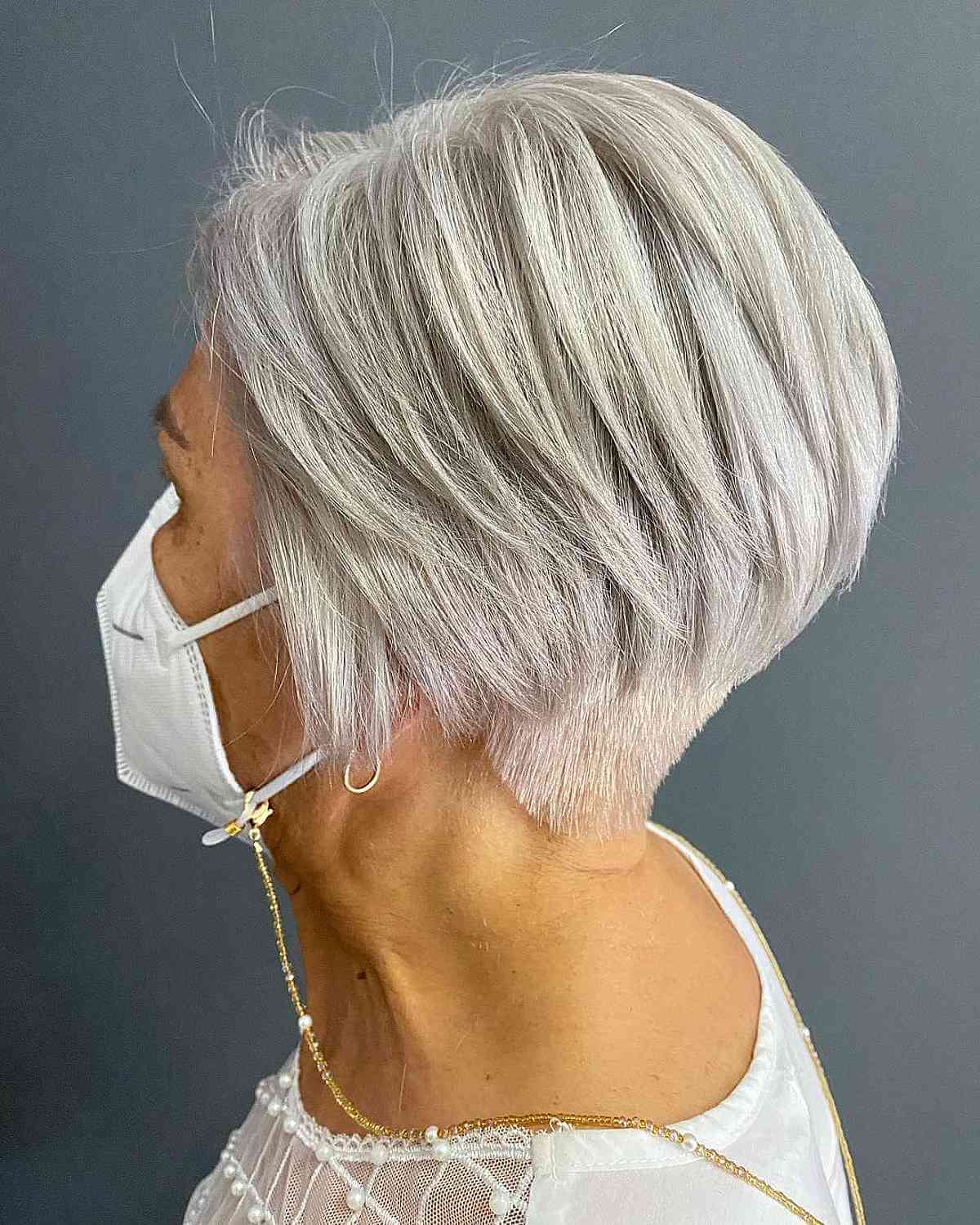 jaw length layered silver wedge bob for 70 year olds
