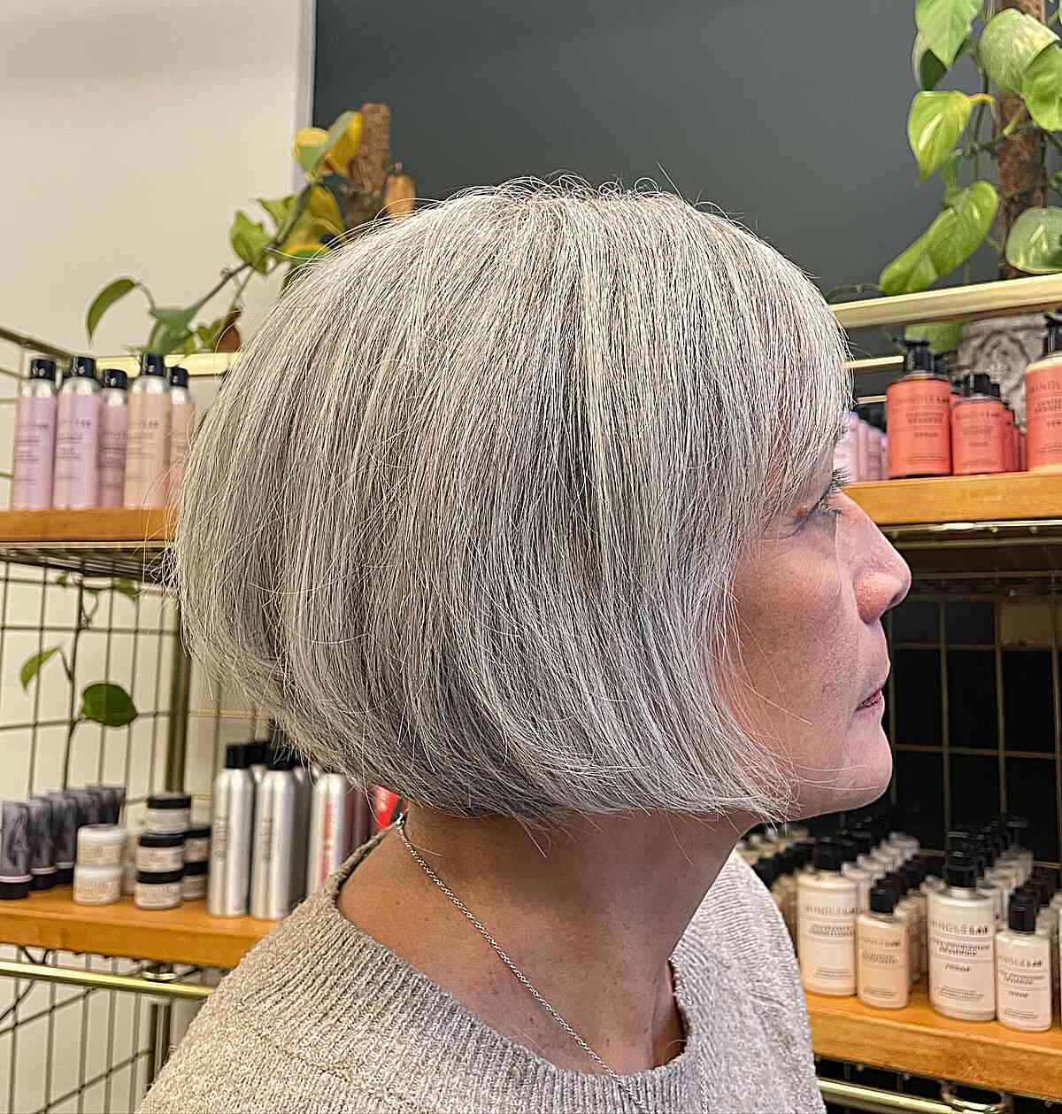 jaw length silver bob with a side fringe for women aged 50