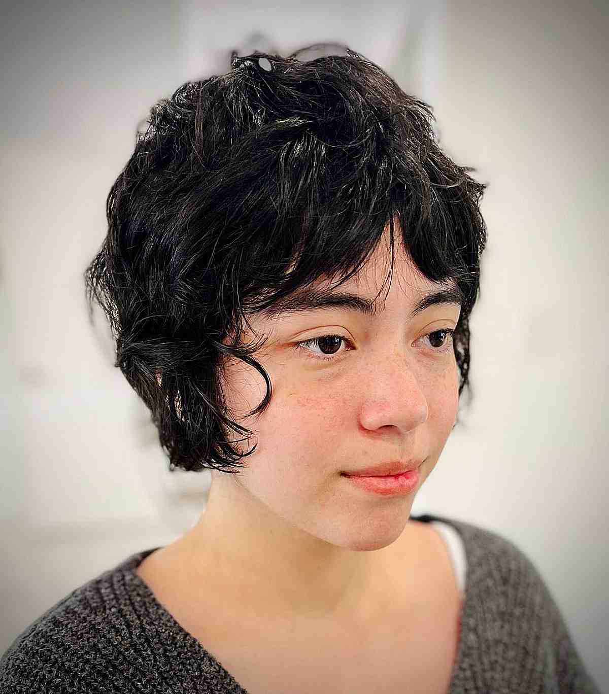 jet black long shaggy pixie with curtain fringe