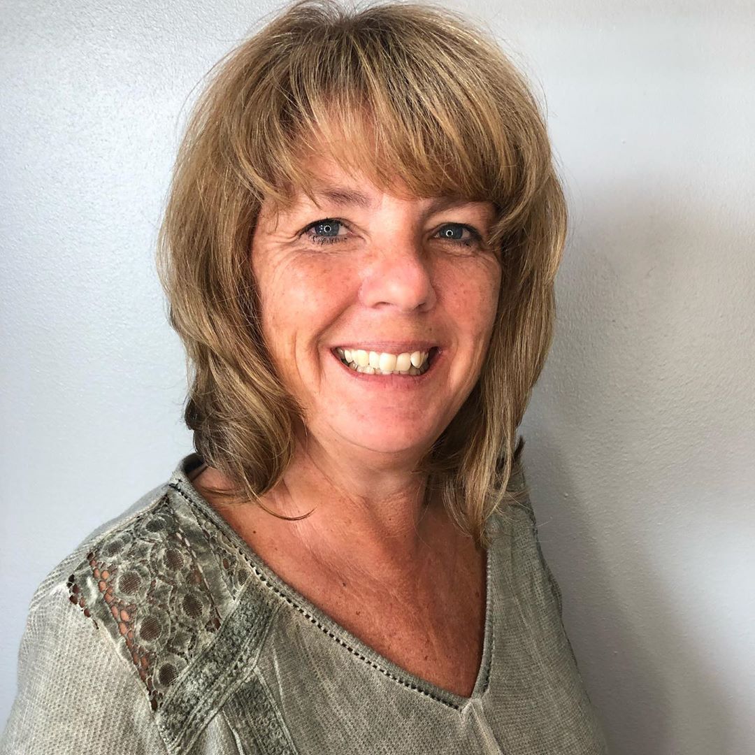 layered bob with bangs for over 50