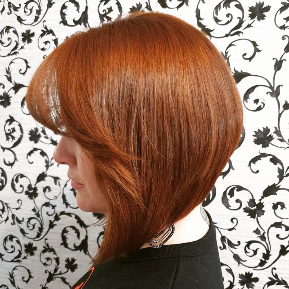 layered bob with bangs for thick hair