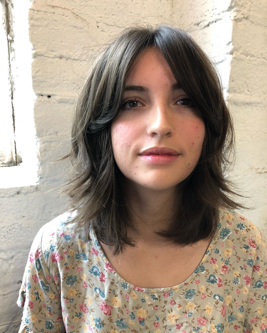 layered bob with curtain bangs