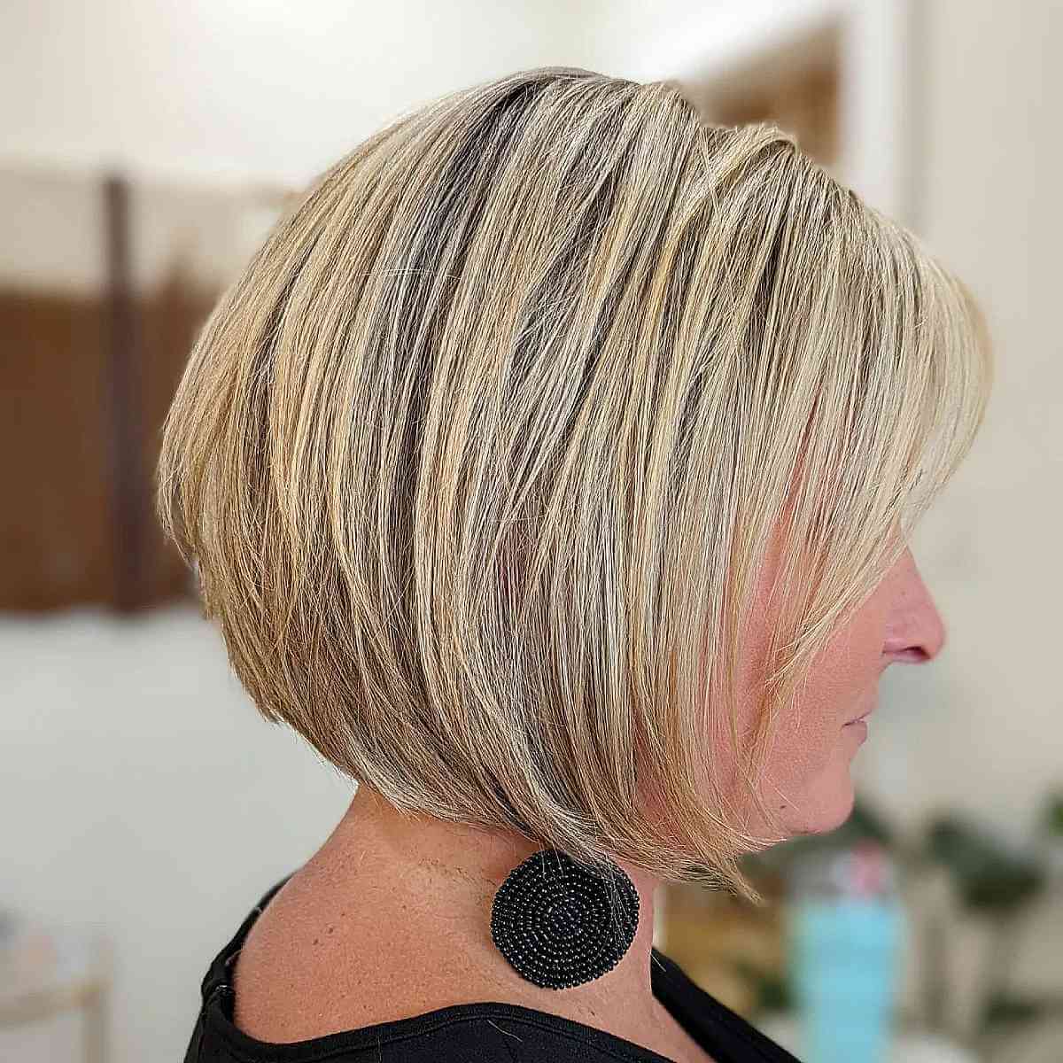 layered concave neck length bob cut
