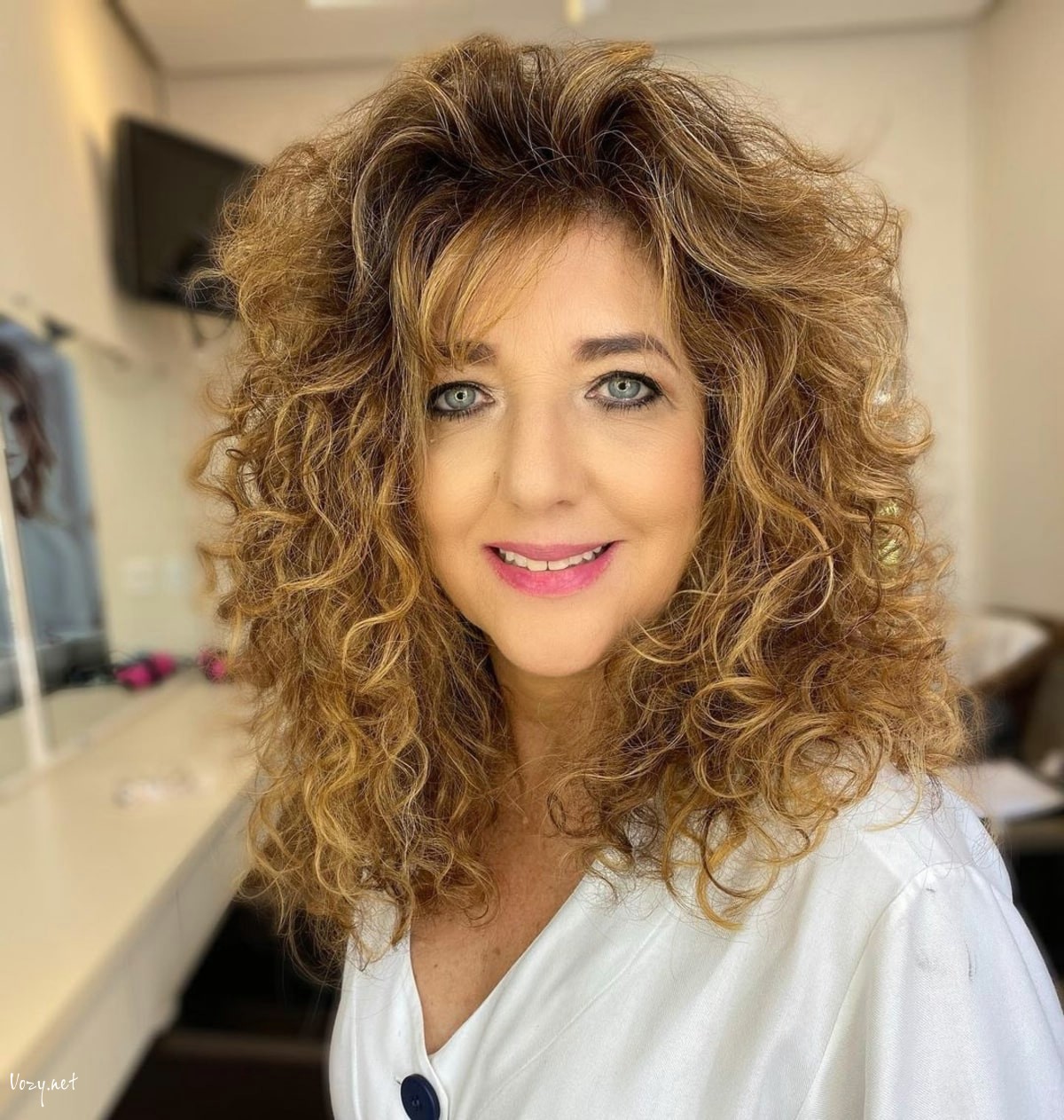 layered curly hair for older women