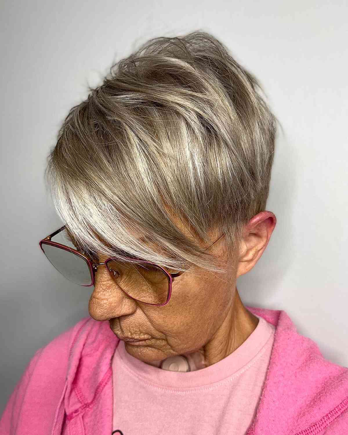 layered pixie with side bangs for ladies past sixty