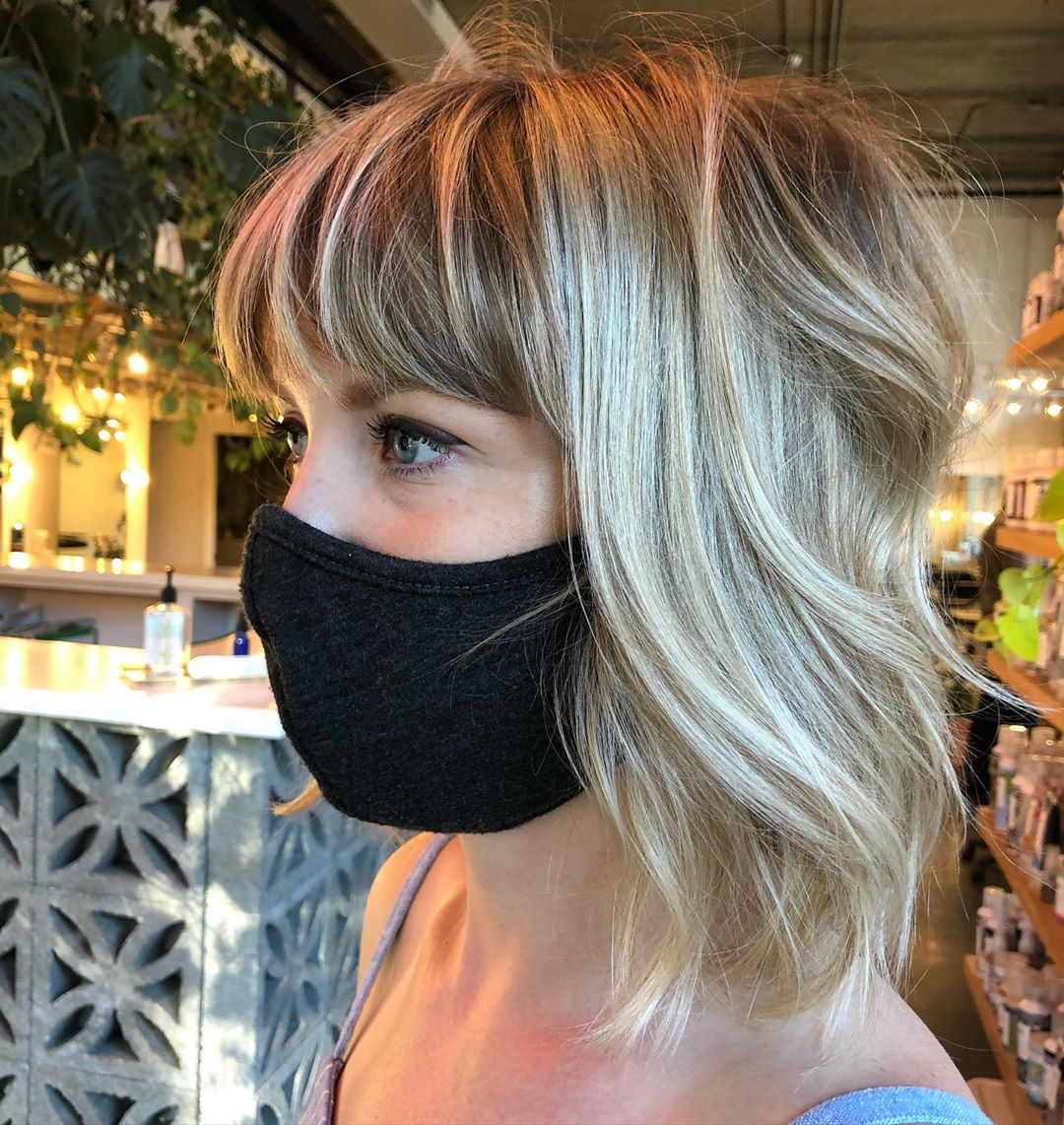layered shaggy bob with bangs 1