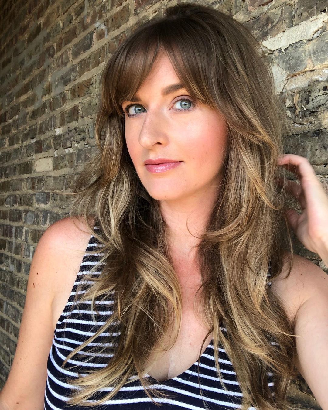 light brown shag with side swept bangs