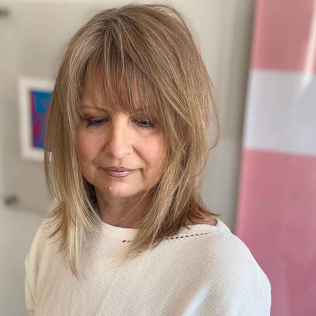 light brown shaggy cut for older ladies