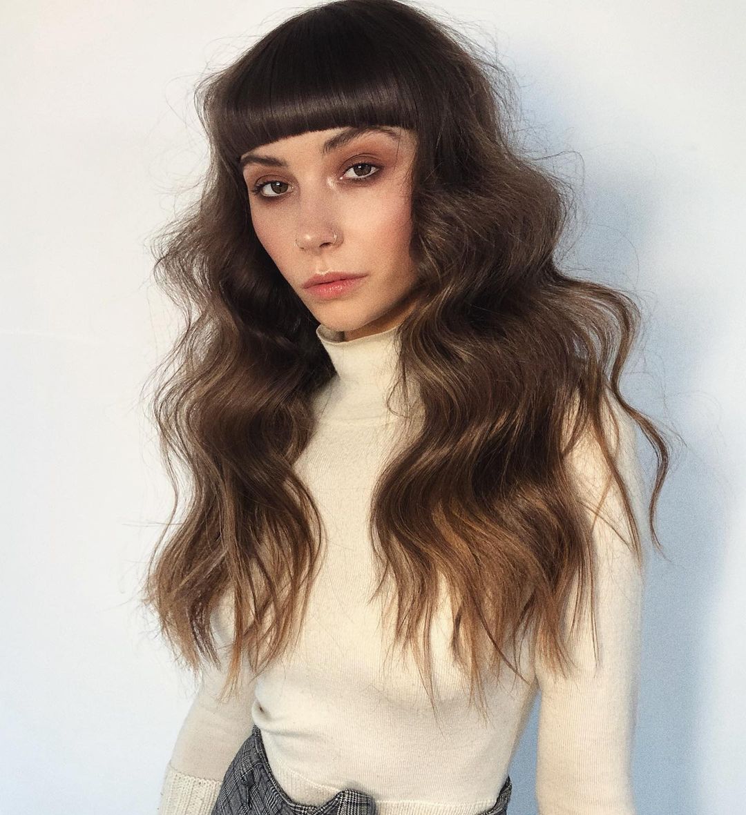 long choppy shag with blunt bangs