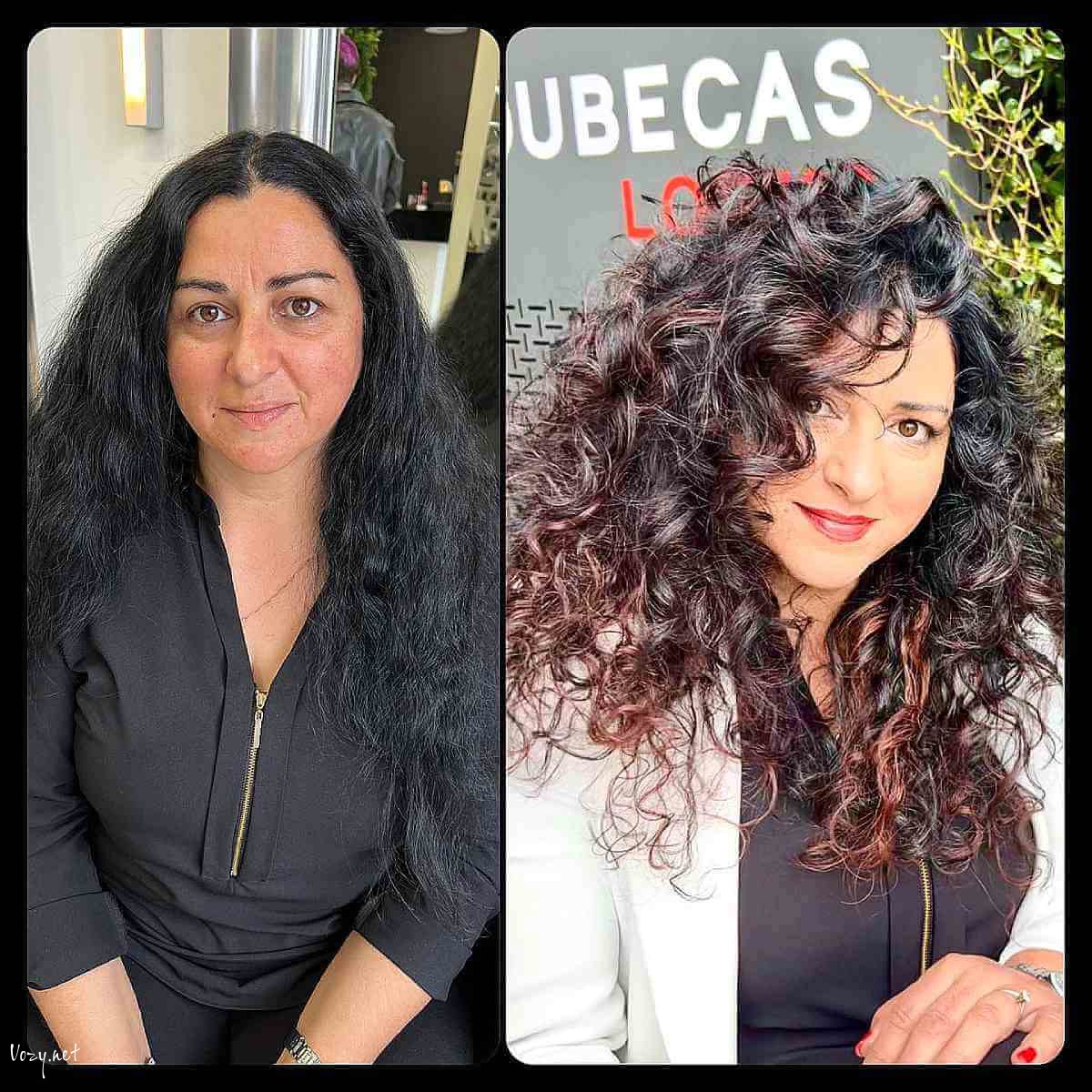 long curly hair with a deep side part and layers