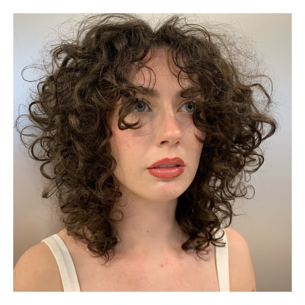 long curtain bangs for curly hair