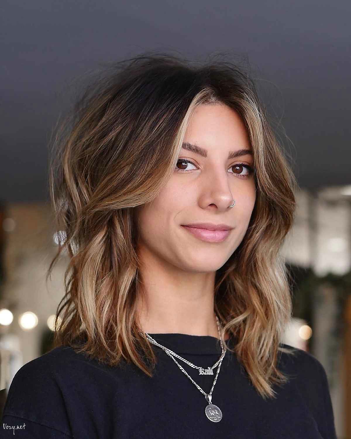 long curtain bangs on a textured shag