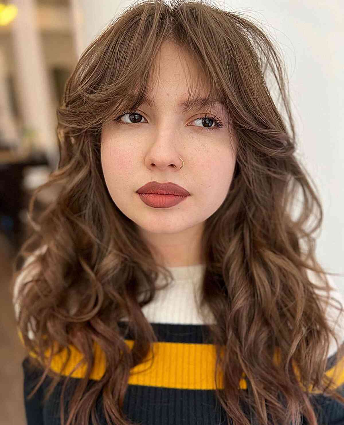 long curtain bangs on long wavy hair by poshstudiony