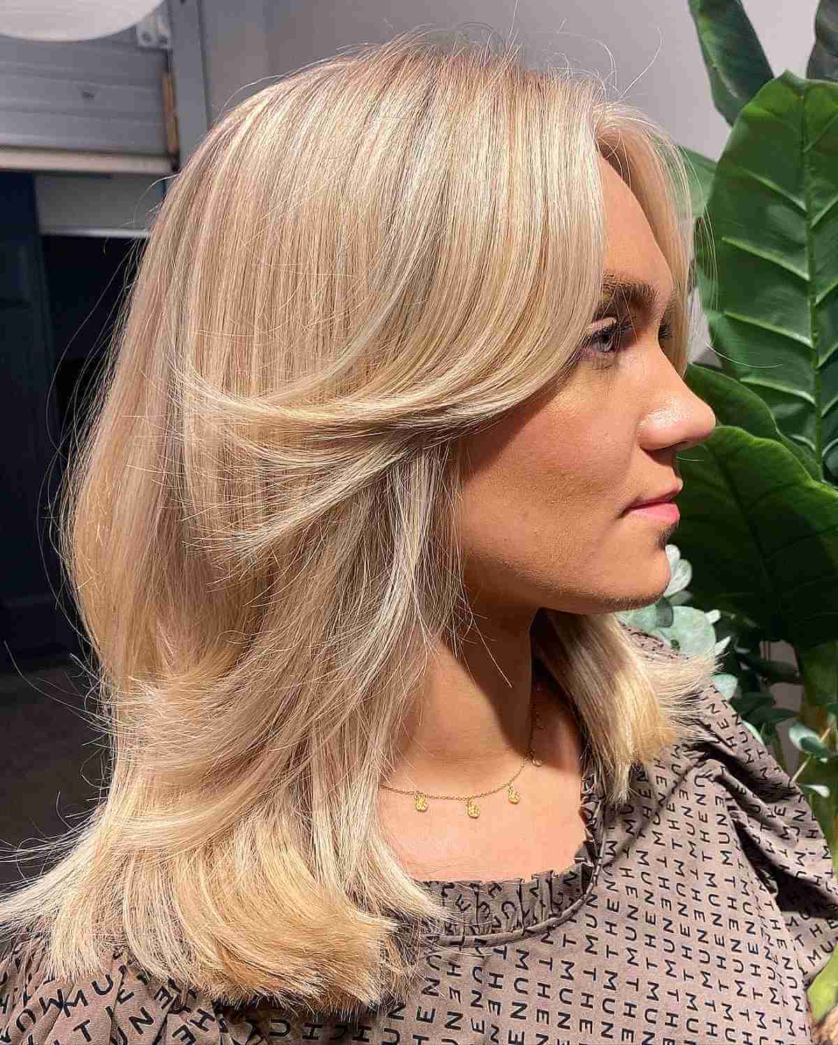 long feathered curtain bangs hairstyle