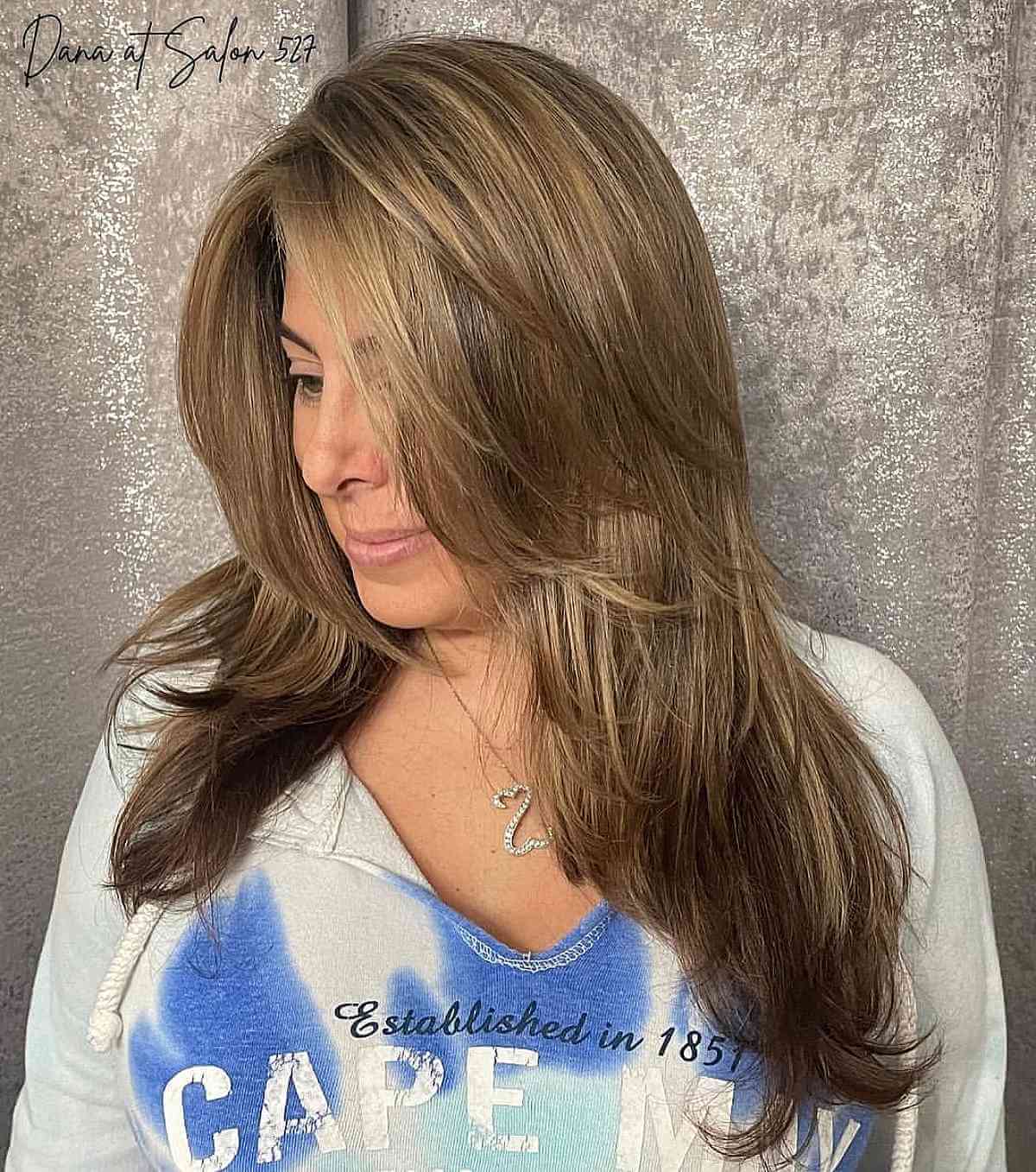 long haircut with face framing layers for women past 40