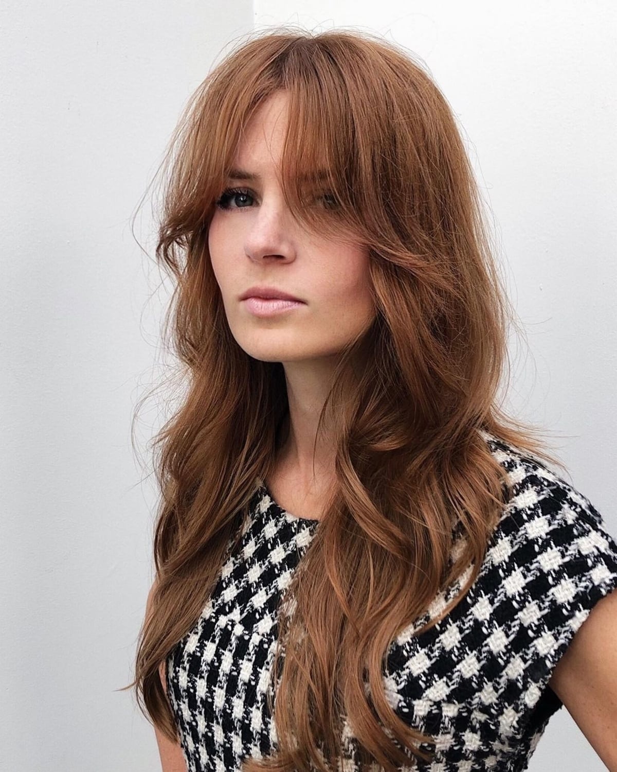 long layered hair with long curtain bangs