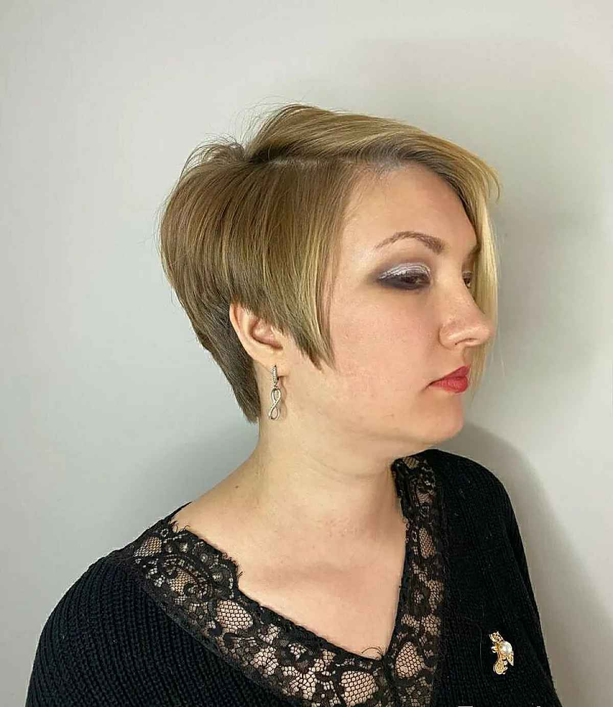 long pixie cut for women aged forty with a deep side part