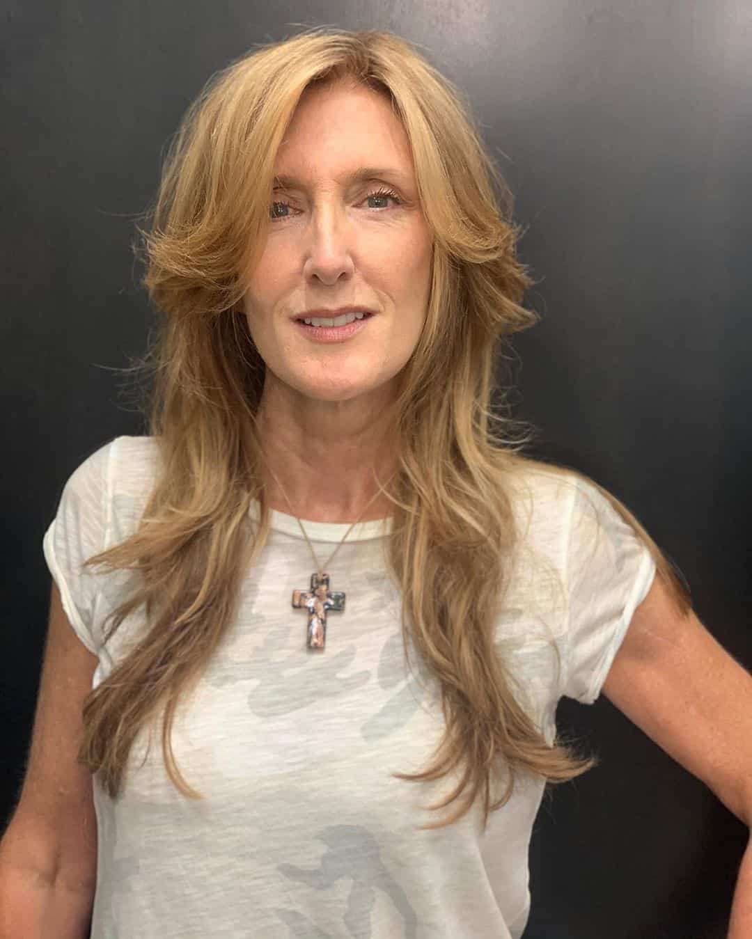 long shag haircut for women in their 50 with thin hair