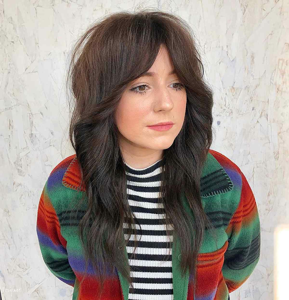 long shag haircut with curtain bangs