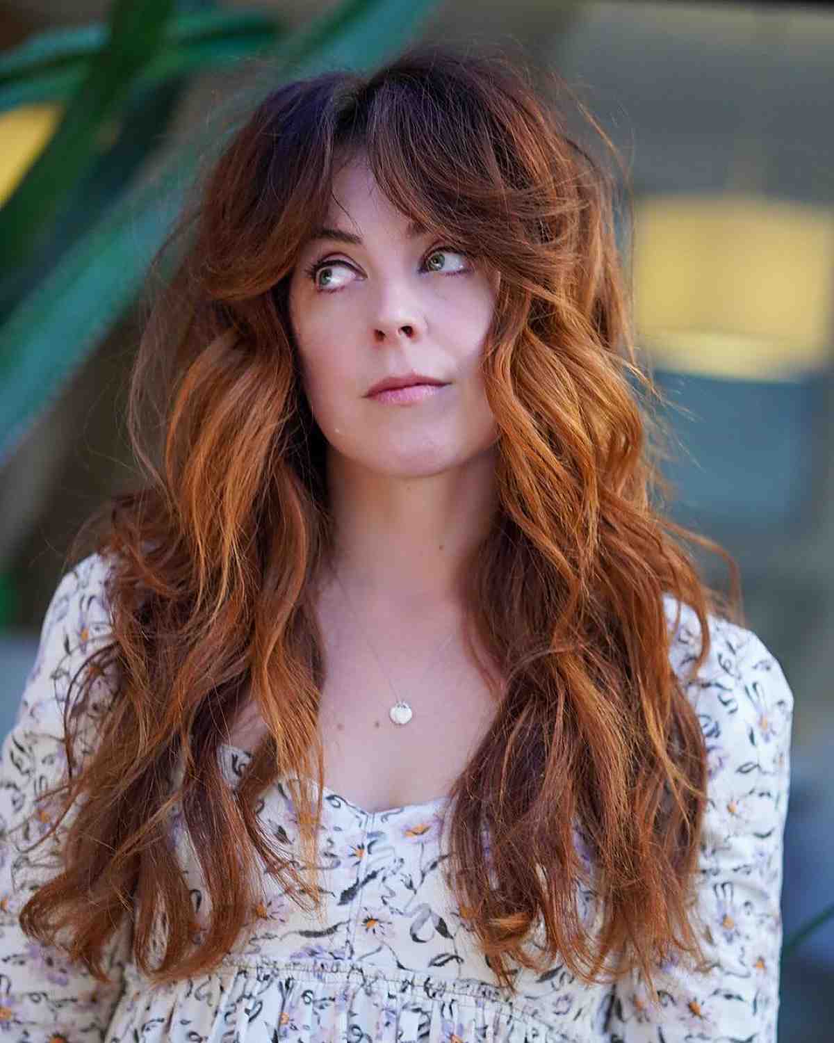 long shag with swoopy curtain bangs
