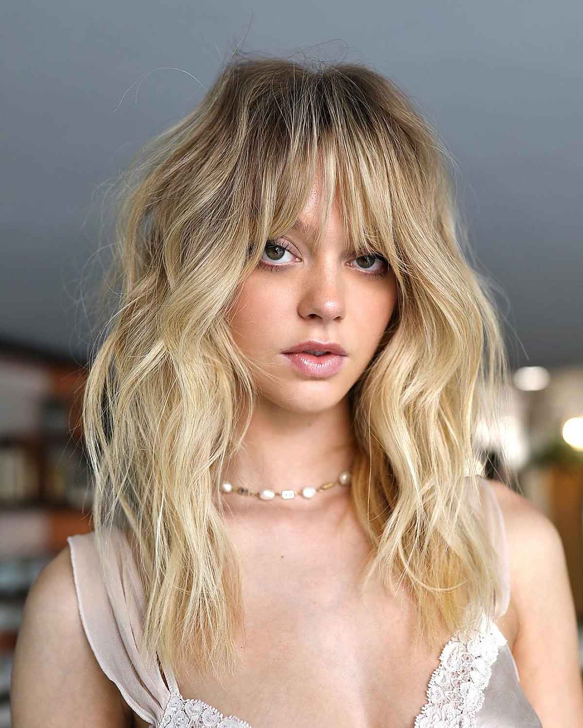 long to medium blonde shag with fringe