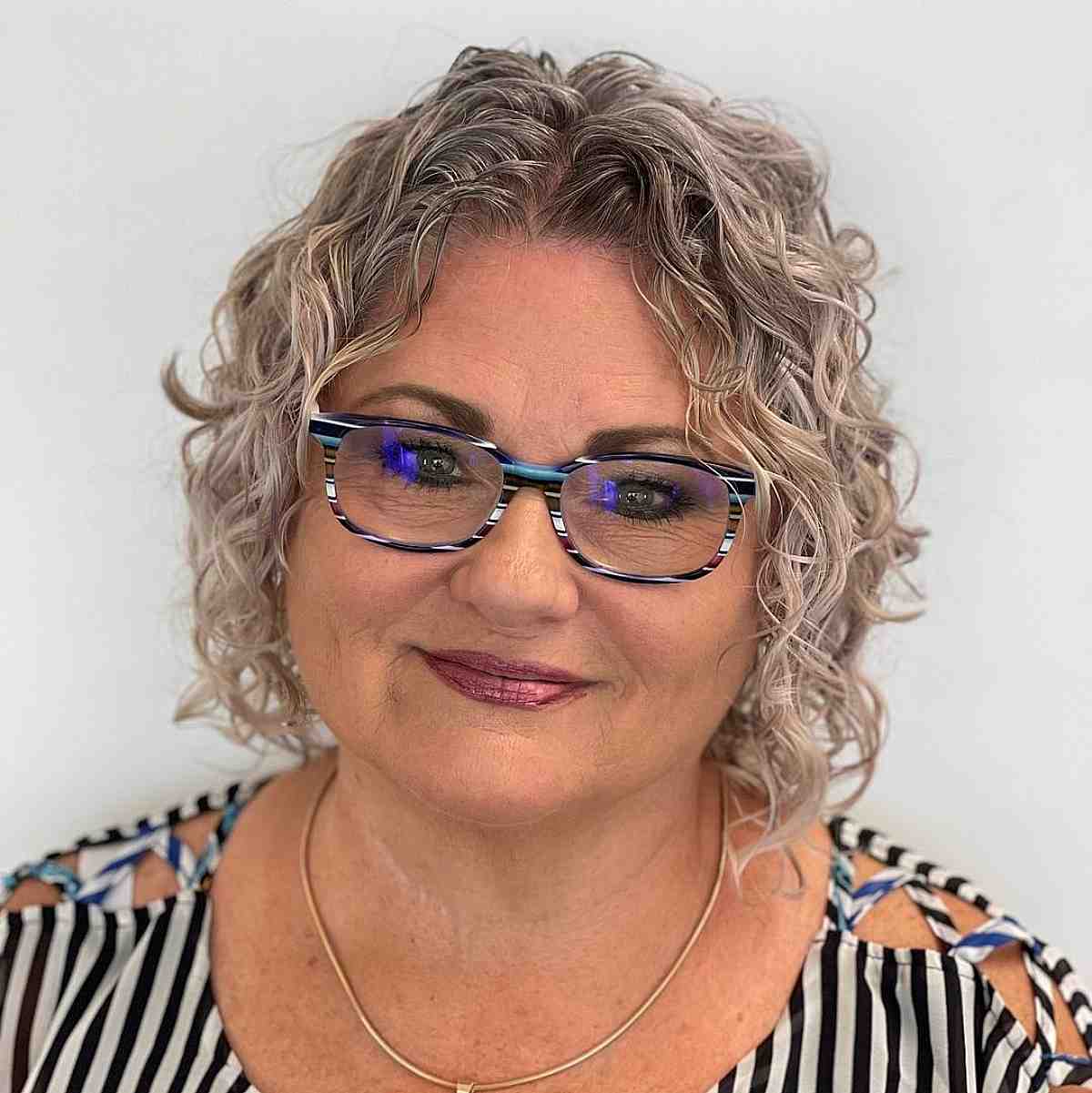 loose curls on short bobbed hair for an older woman