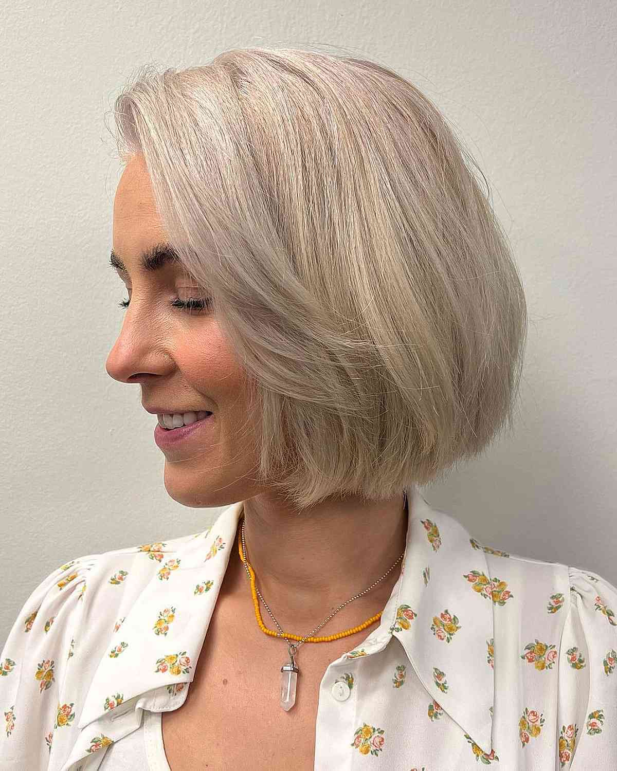 mature pale neck length blonde bob for older women