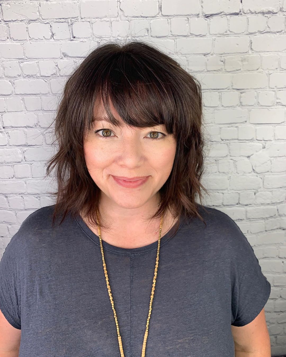 medium layered bob with bangs 1