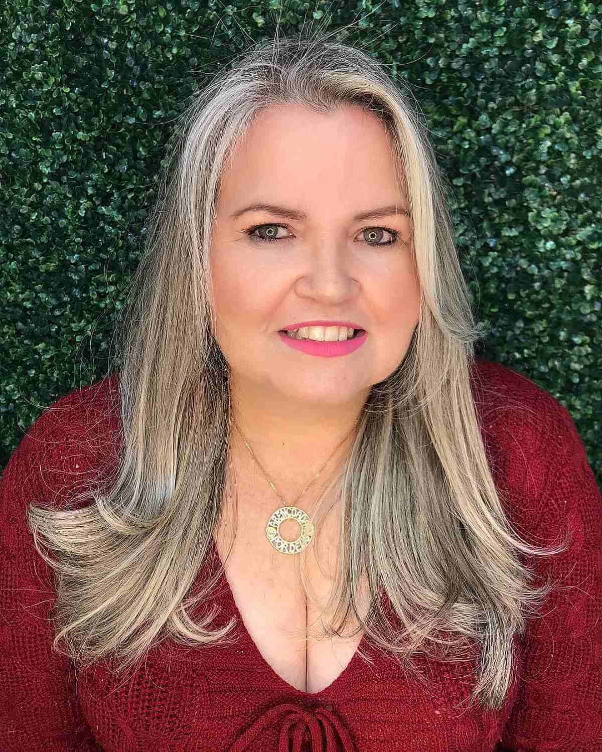 medium length blonde balayage for women over 60 with round faces