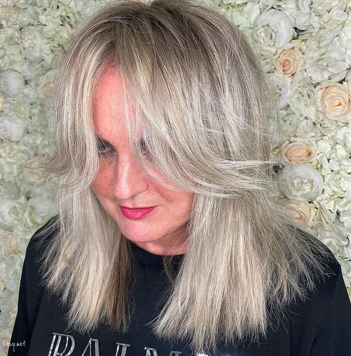 messy style with long curtain fringe