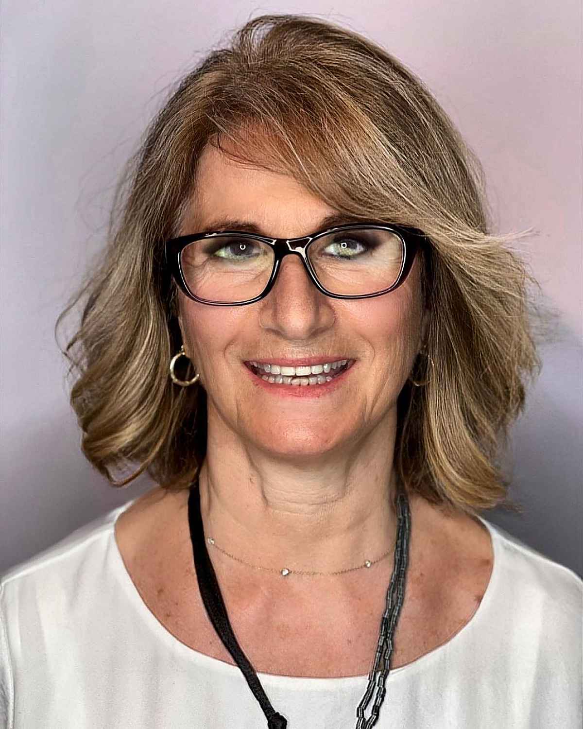 mid length cut for women over 70 with small glasses