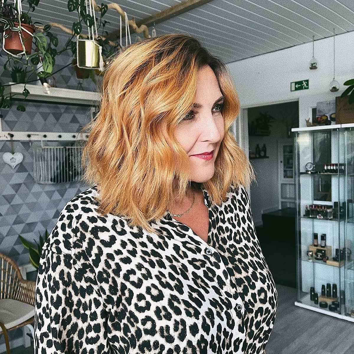 mid length golden blonde waves women over 60 years old
