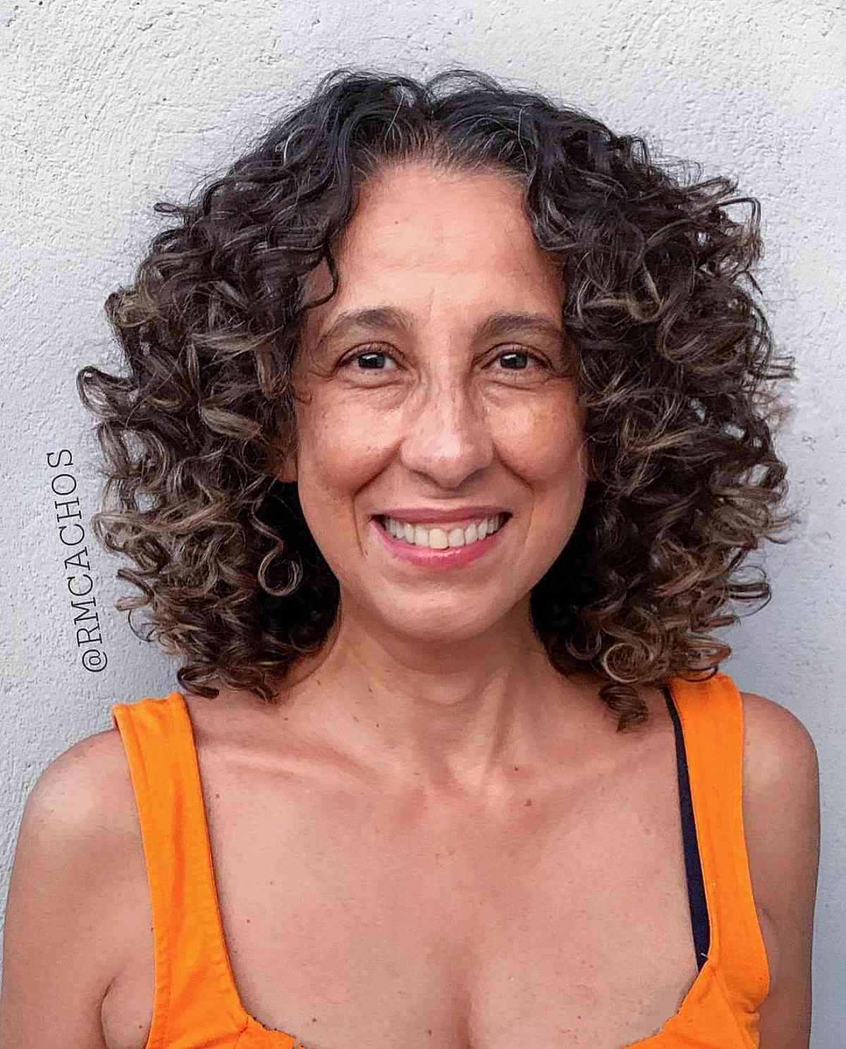 mid length sweet shaggy curls for ladies 60 and over