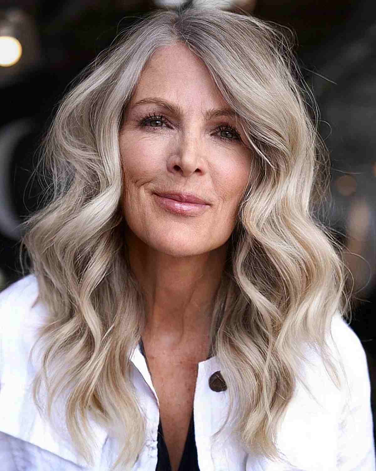 mid length wavy hair with a side part for 60 year old ladies