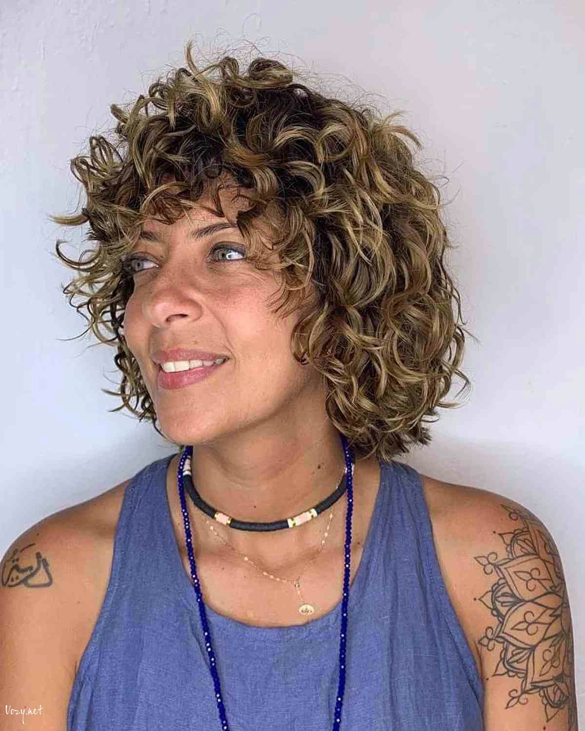 naturally curly hair with layers