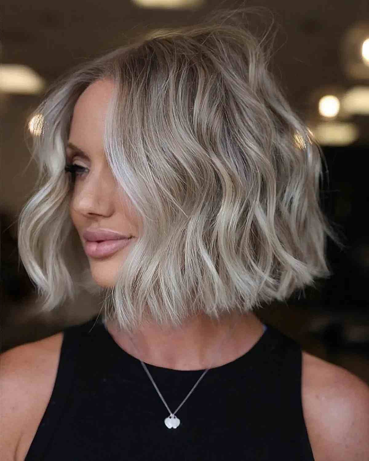 neck length blunt cut with beach waves