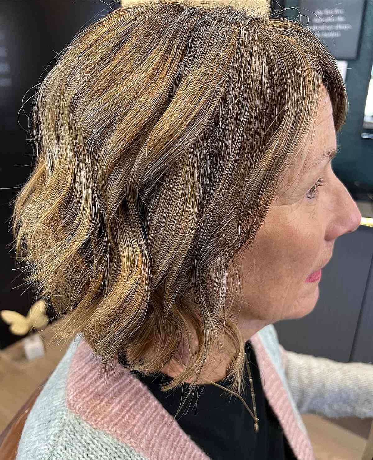 neck length wavy bob hairstyle for women in their 70s