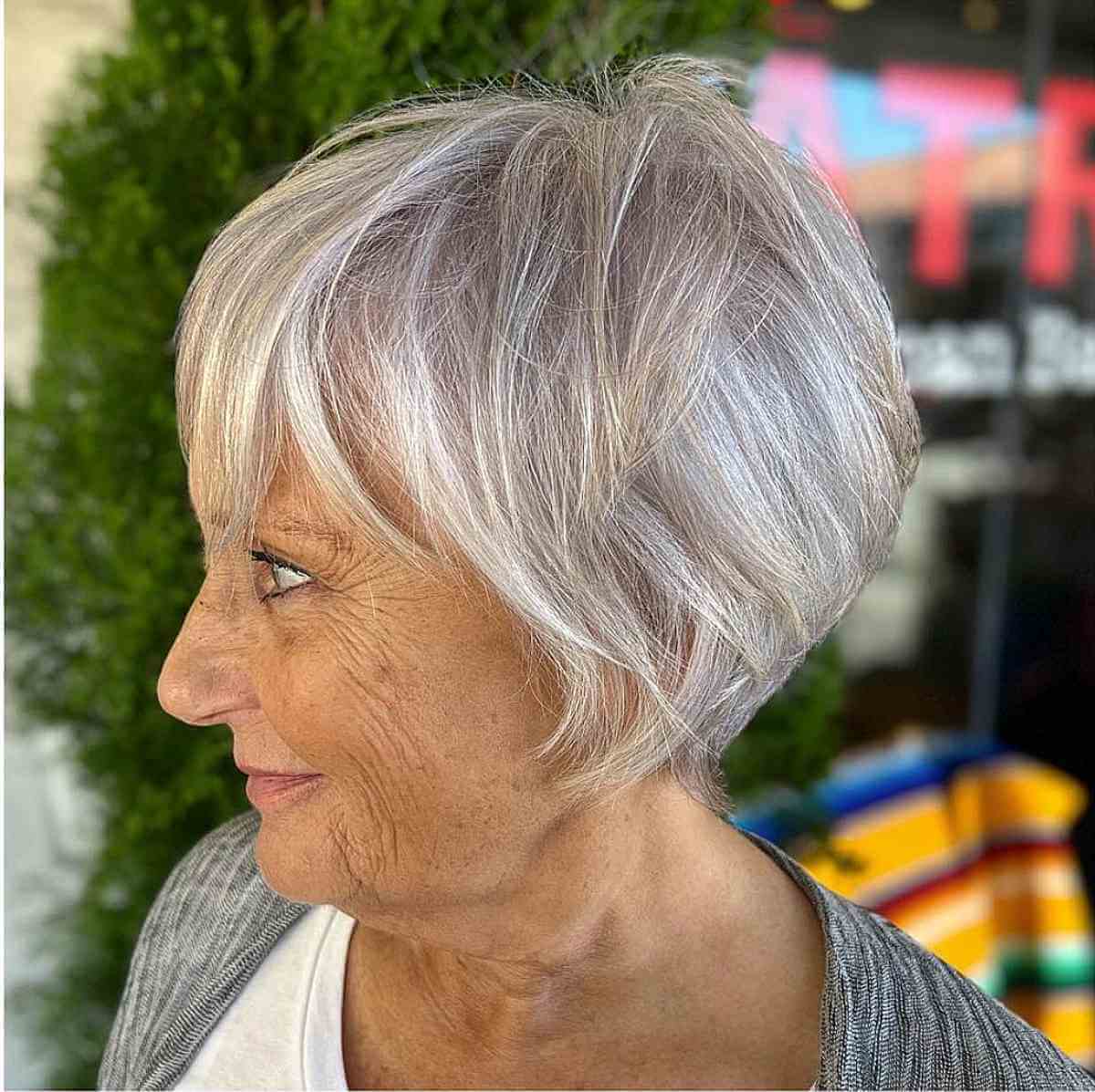 pixie bob with soft bangs on thinning hair women in their sixties